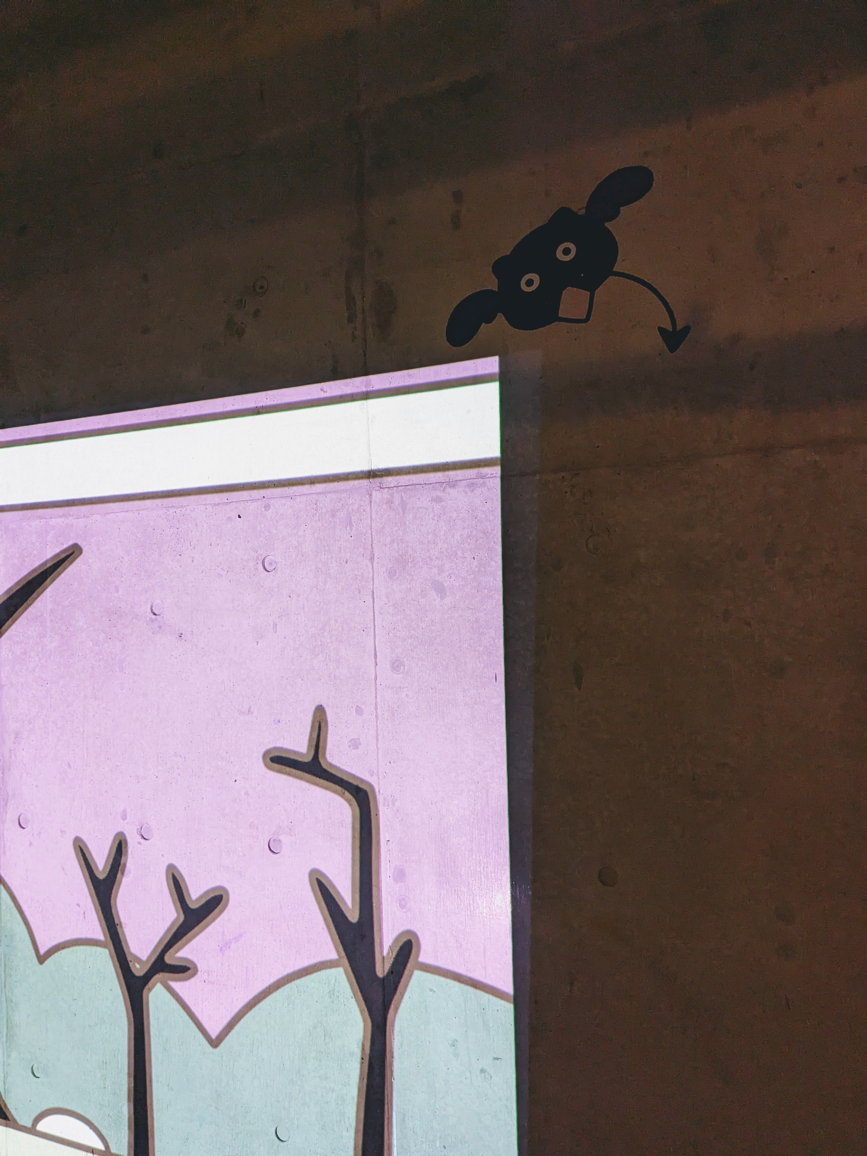 Close-up of A HERO AND A GARDEN projector screen with Sooty flying above